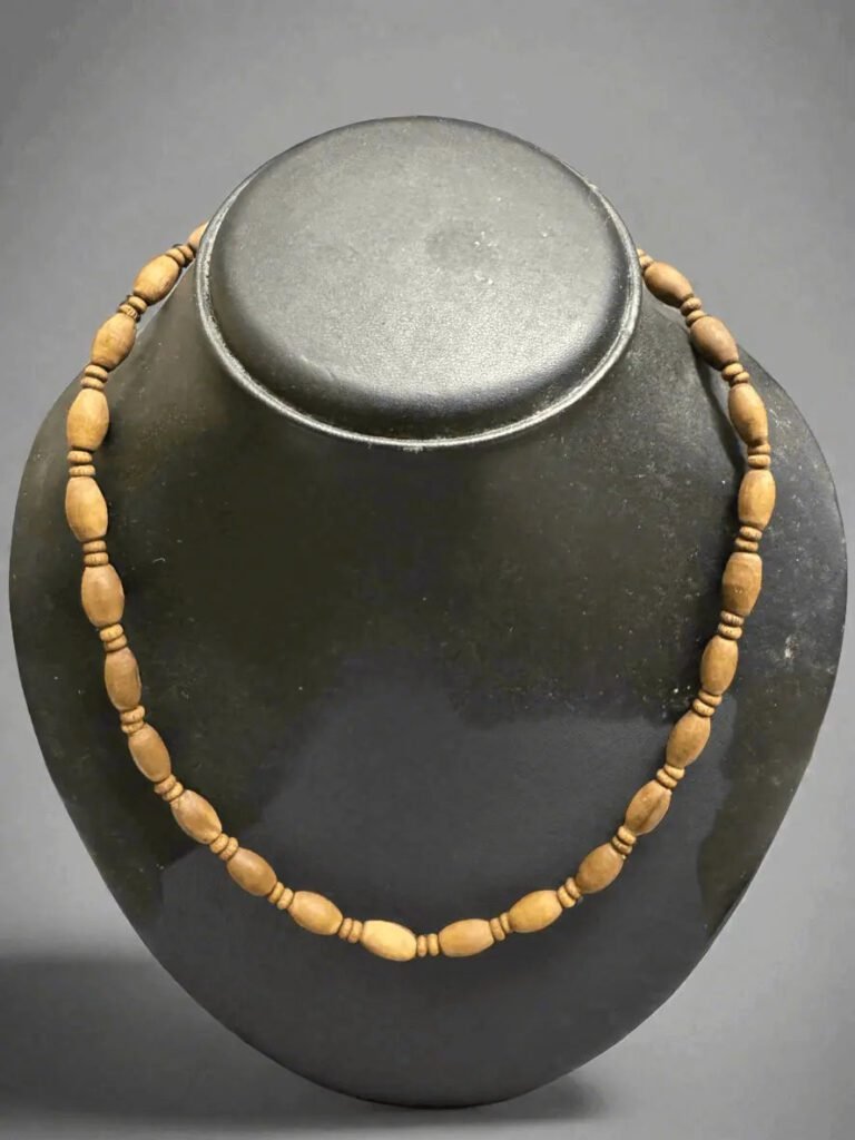 A tulsi kanthi mala worn around the neck, handcrafted from sacred Tulsi wood